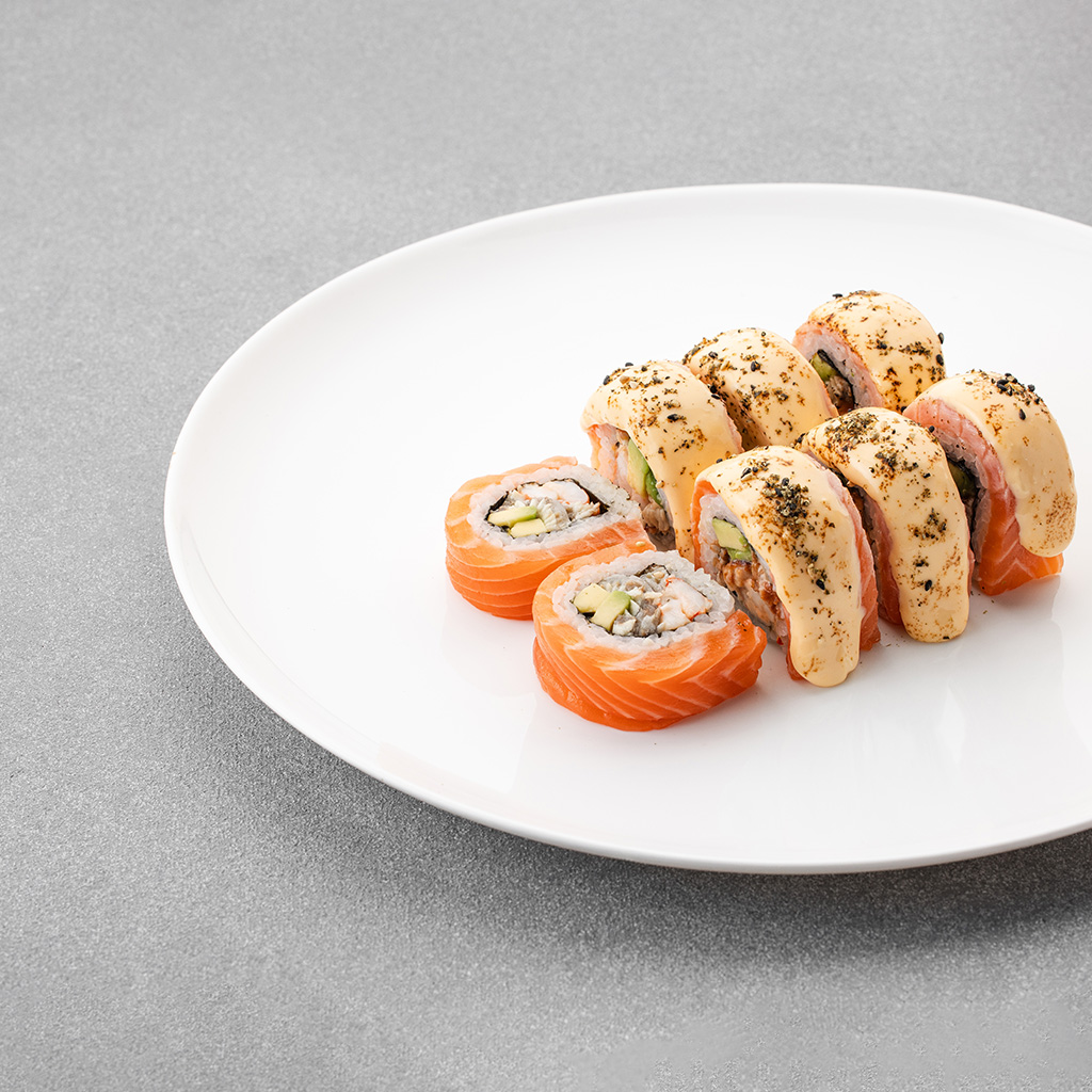 Salmon roll with cheese sauce